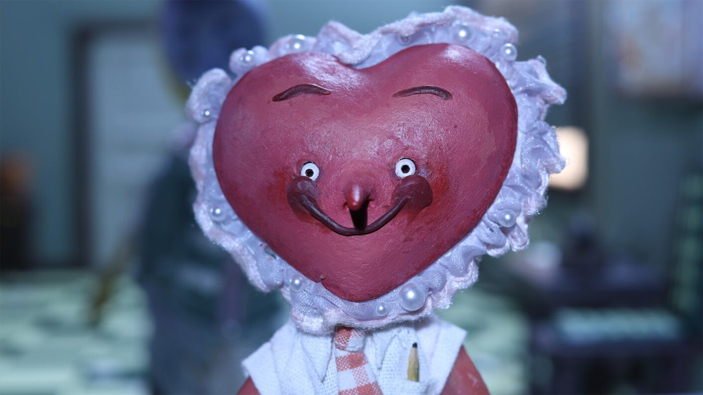 animaatiohahmo, jolla on sydämenmuotoinen pää