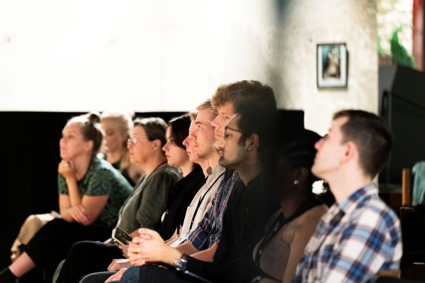 people listening a presentation